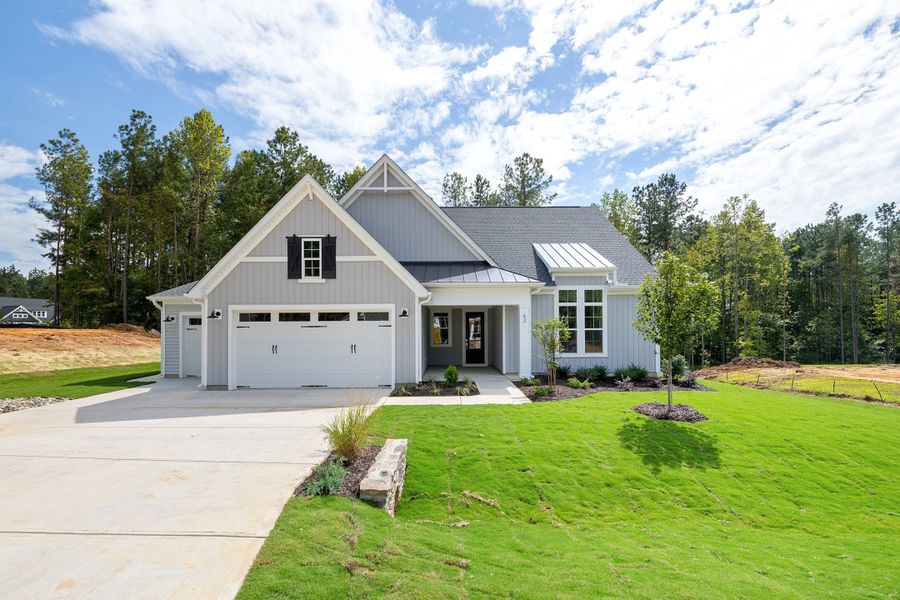 Representative exterior photo of a completed home built from the The Bradley by RobuckHomes in Baylee Ridge, Selma, NC (Image 52). Representative exterior photo of a completed home built from the The Bradley by RobuckHomes in Baylee Ridge, Selma, NC (Image 52).