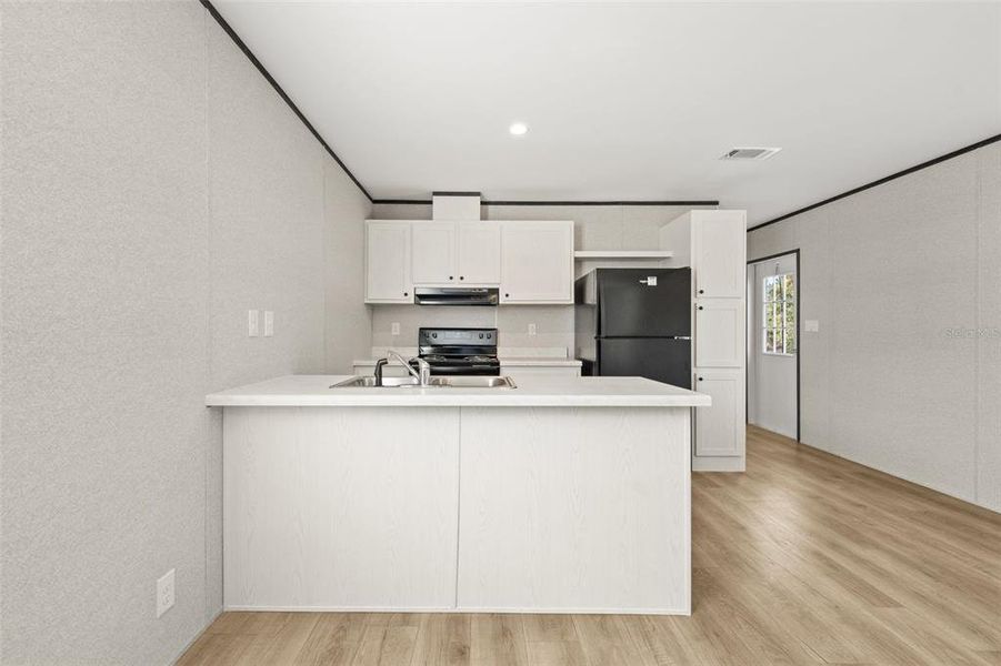 Furnished interior view inside a new home in , Bronson (Image 3).