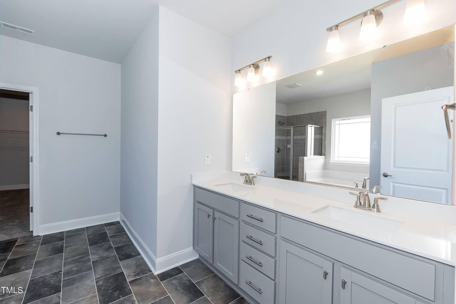 Representative furnished interior of a home built from the 2906 by Adams Homes in Norris Landing, Snellville (Image 11).