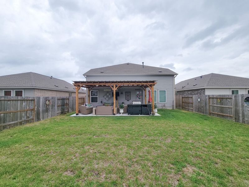 Exterior details and patio area of a home in Tavola, New Caney (Image 23).