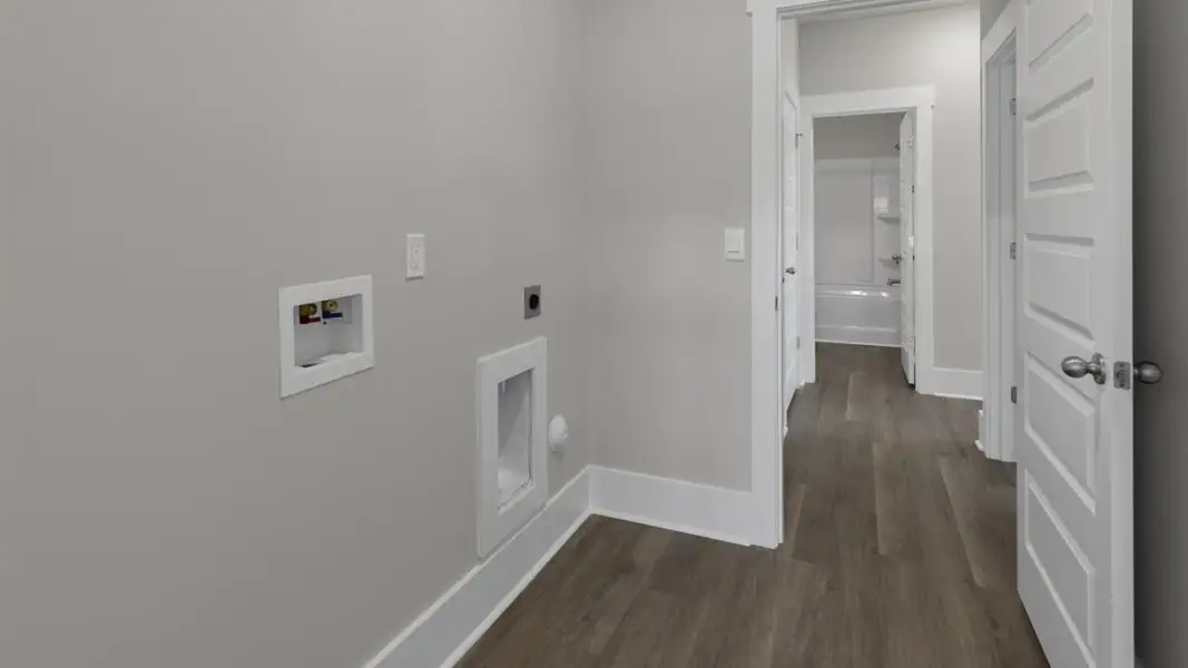 Spacious, unfurnished interior of a new home in The Retreat at Indigo Preserve Townhomes, Leland (Image 26).