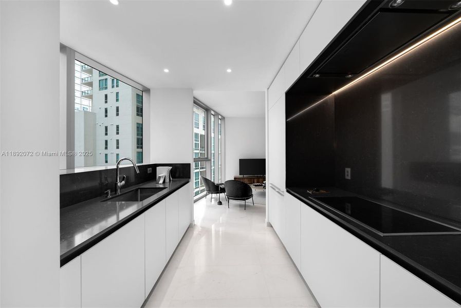 Furnished interior view inside a new home in Aston Martin Residences, Miami (Image 2).