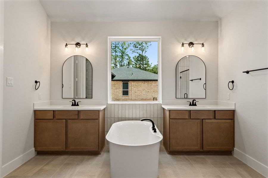 Furnished interior view inside a new home in Deer Pines, Conroe (Image 12).