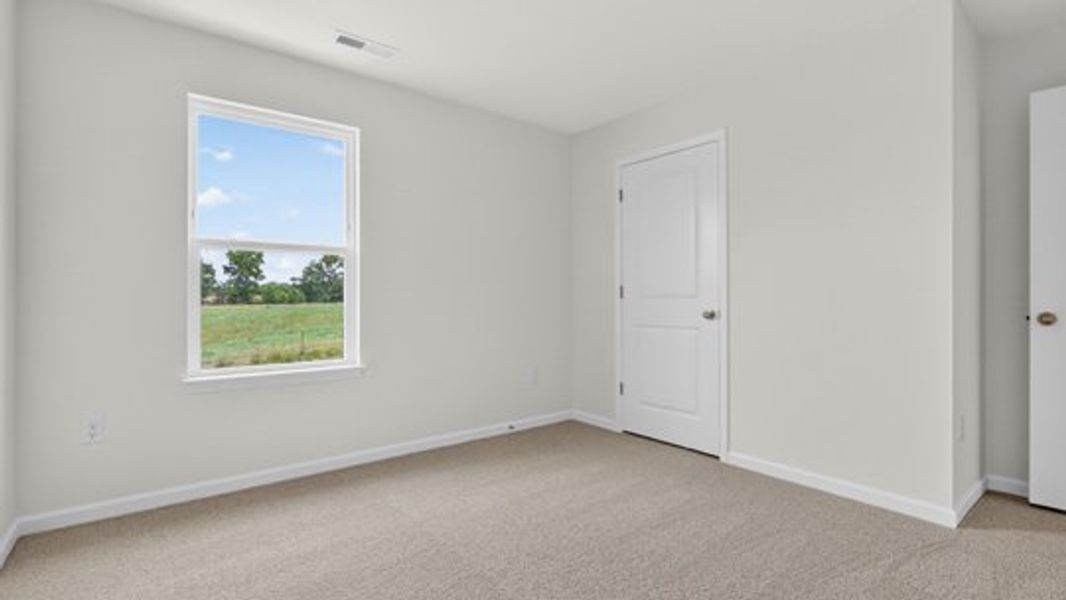 Spacious, unfurnished interior of a new home in Honeycutt Oaks, Angier (Image 22).