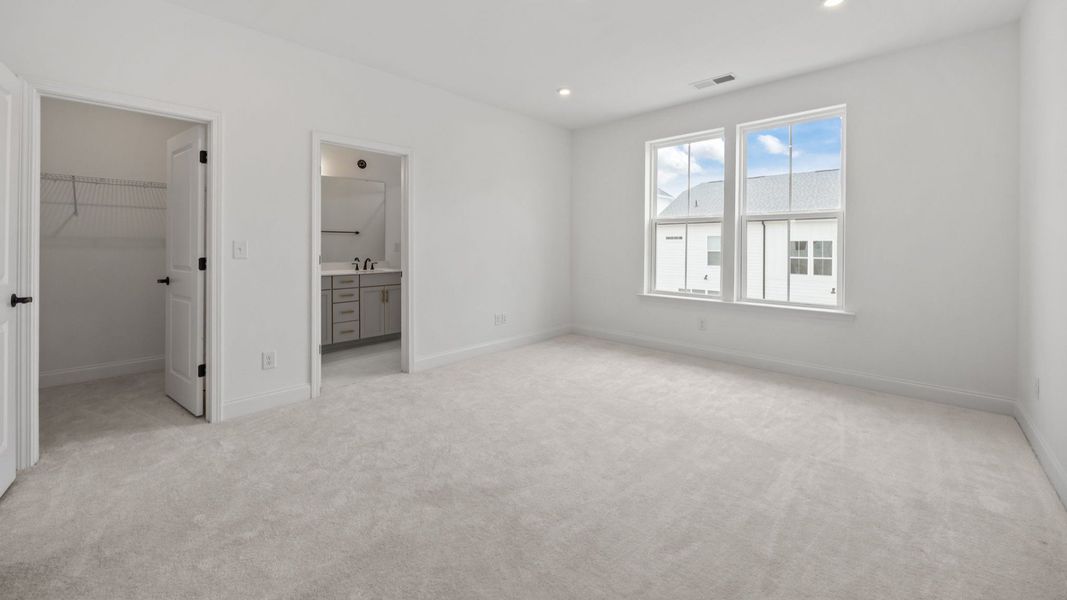 The Landon Plan in River District by DBR Homes in Charlotte, N.C - Primary bedroom