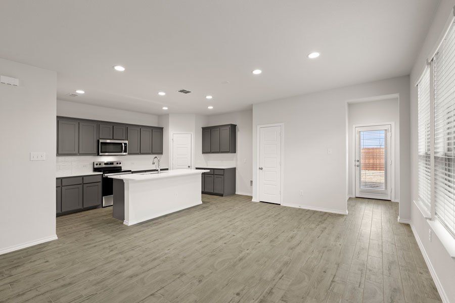 Representative exterior photo of a completed home built from the Mesquite by Impression Homes in Creekside Ranch, Blue Ridge, TX (Image 7). Representative exterior photo of a completed home built from the Mesquite by Impression Homes in Creekside Ranch, Blue Ridge, TX (Image 7).