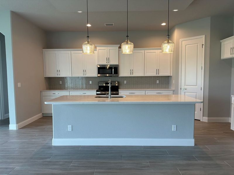 Representative furnished interior of a home built from the Avery by Paytas Homes in The Reserve at Victoria, Deland (Image 31).