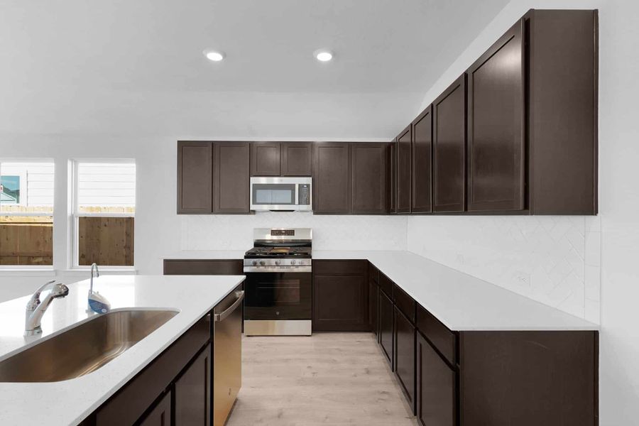 Furnished interior view inside a new home in Briarwood, Elgin (Image 9).