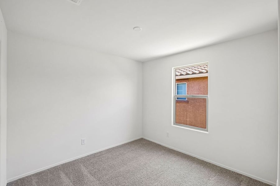 Spacious, unfurnished interior of a new home in Mandarina Reserve, Marana (Image 19). Spacious, unfurnished interior of a new home in Mandarina Reserve, Marana (Image 19).