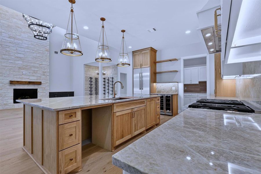 A spacious island serves as both a functional workspace and social hub.