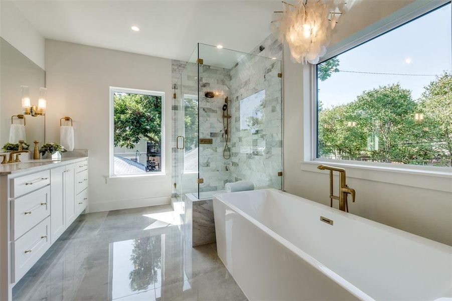 primary bathroom with soaking tub and walk in shwoer