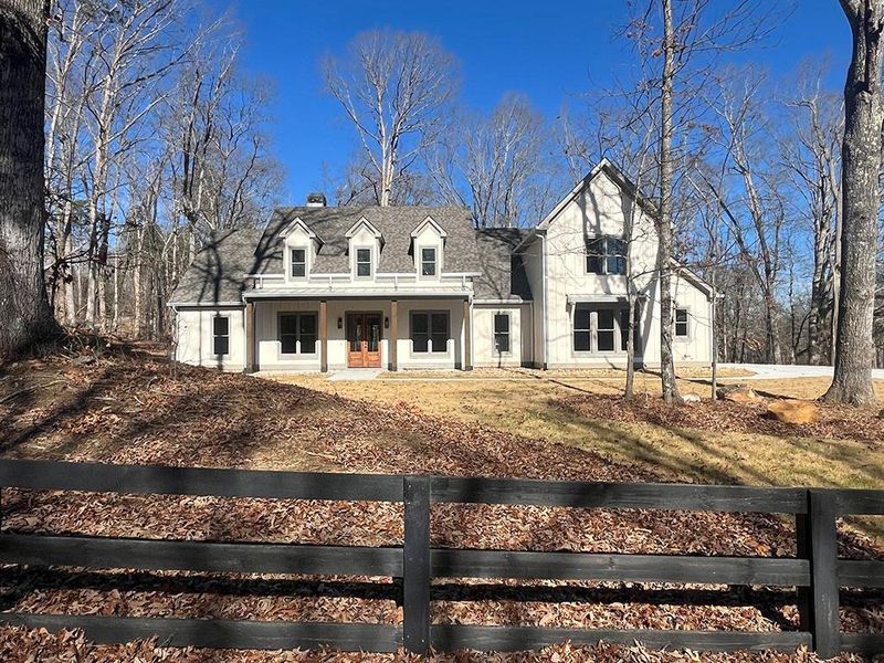 Front exterior of a new home in , Ball Ground, GA, highlighting curb appeal (Image 23).