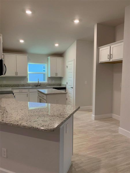Furnished interior view inside a new home in Twisted Oaks, Beverly Hills (Image 4).