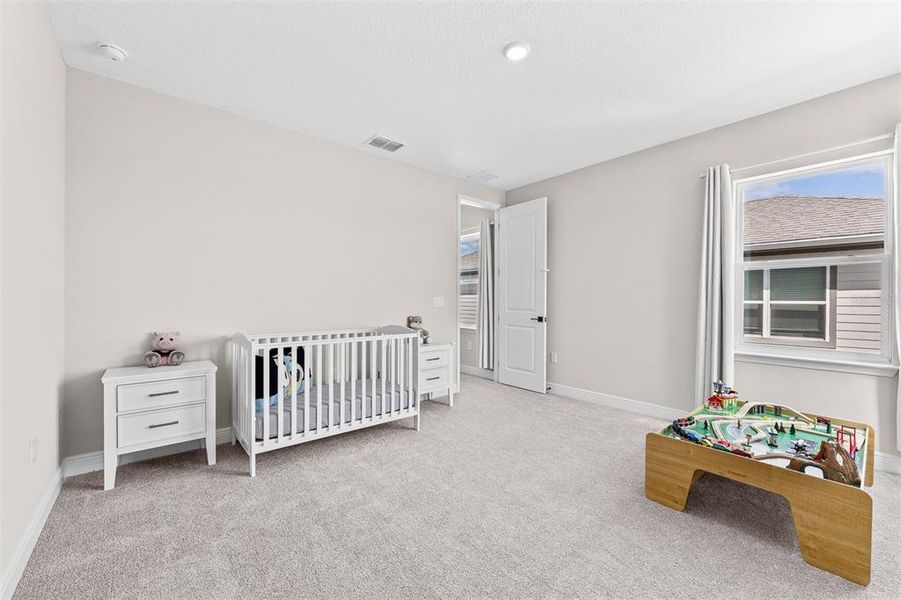 Furnished interior view inside a new home in Laureate Park, Orlando (Image 44).