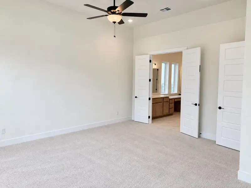 Spacious, unfurnished interior of a new home in Santa Rita Ranch, Liberty Hill (Image 15). Spacious, unfurnished interior of a new home in Santa Rita Ranch, Liberty Hill (Image 15).
