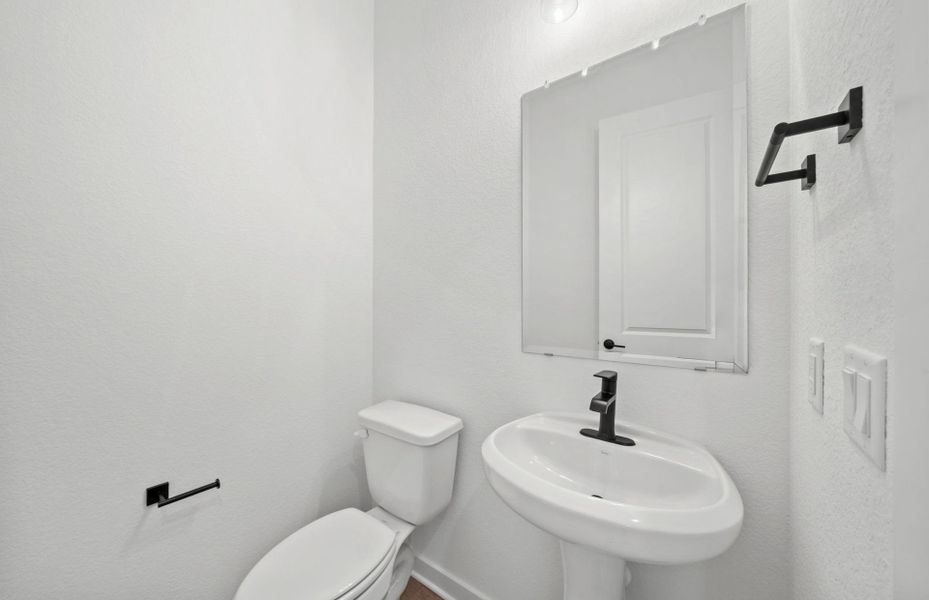 Furnished interior view inside a new home in 6 Creeks, Kyle (Image 5).