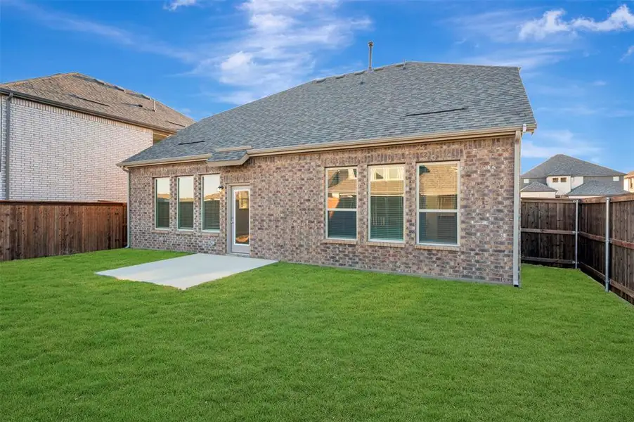 Exterior details and patio area of a home in Lily Creek at Sutton Fields, Aubrey (Image 4).