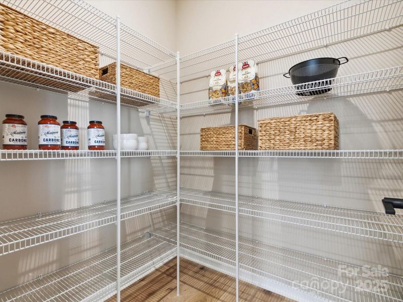 Large Walk-In Pantry. *Model Photos | Actual Finishes, Structural Selections, and Orientation May Vary.