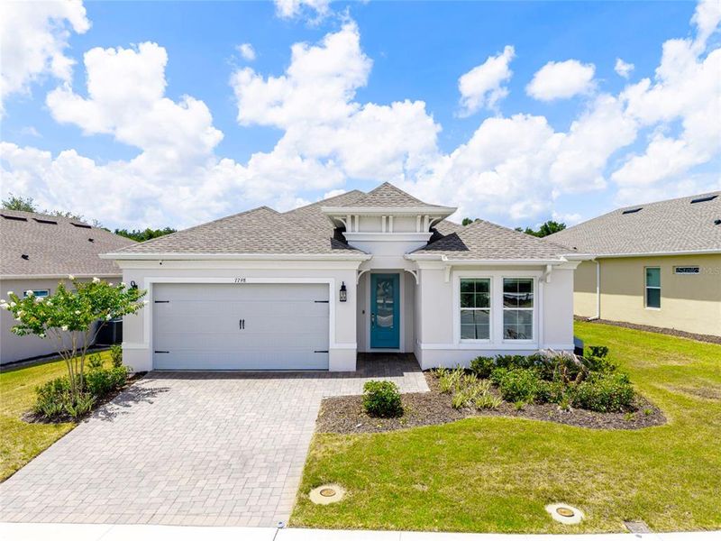 Front exterior of a new home in , Kissimmee, FL, highlighting curb appeal (Image 26). Front exterior of a new home in , Kissimmee, FL, highlighting curb appeal (Image 26).