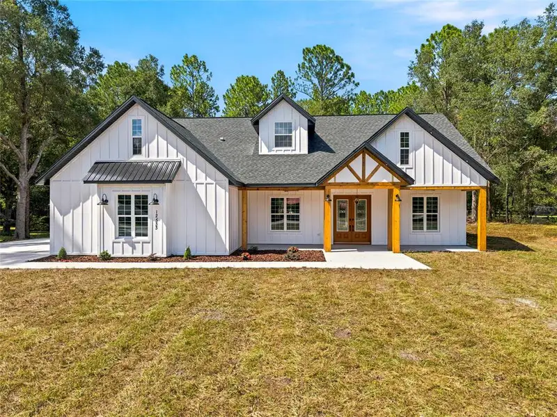 Front exterior of a new home in , Ocala, FL, highlighting curb appeal (Image 27). Front exterior of a new home in , Ocala, FL, highlighting curb appeal (Image 27).