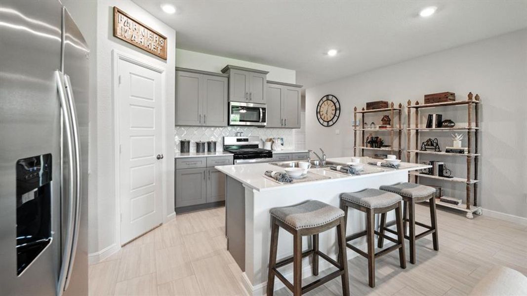 Kitchen- 
All Home and community information, including pricing, included features, terms, availability and amenities, are subject to change at any time without notice or obligation. All Drawings, pictures, photographs, video, square footages, floor plans, elevations, features, colors and sizes are approximate for illustration purposes only and will vary from the homes as built.