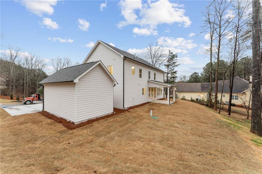 Exterior details and patio area of a home in The Reserve at Knollwood, Canton (Image 3).