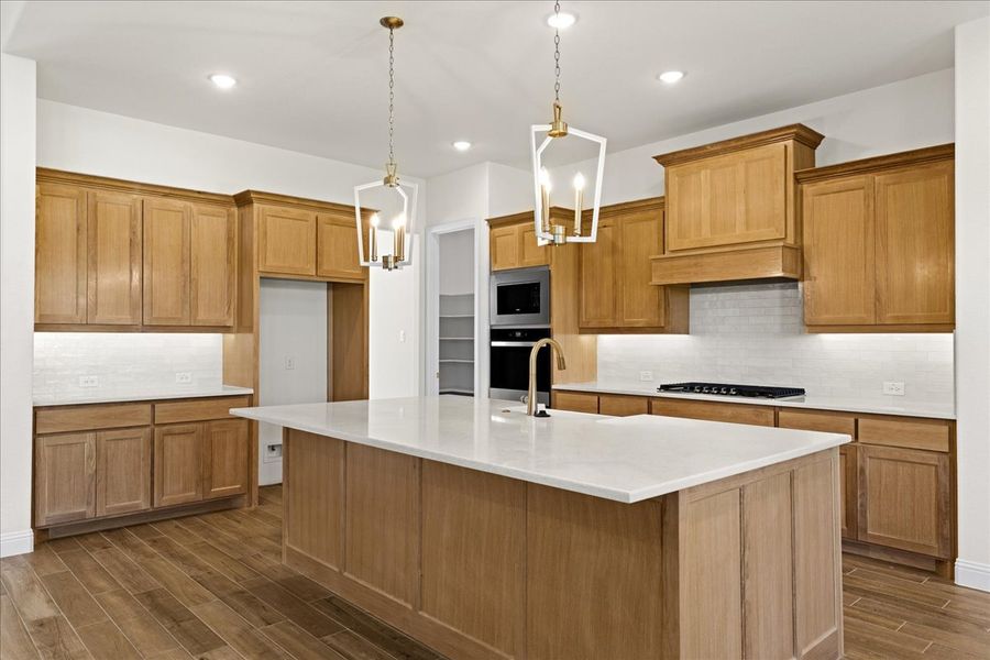 Representative furnished interior of a home built from the The Braden II by Doug Parr Custom Homes in Kessler Farms, Brock (Image 8).