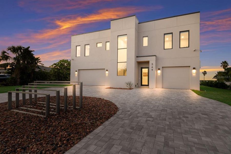 Front exterior of a new home in , Longboat Key, FL, highlighting curb appeal (Image 2).