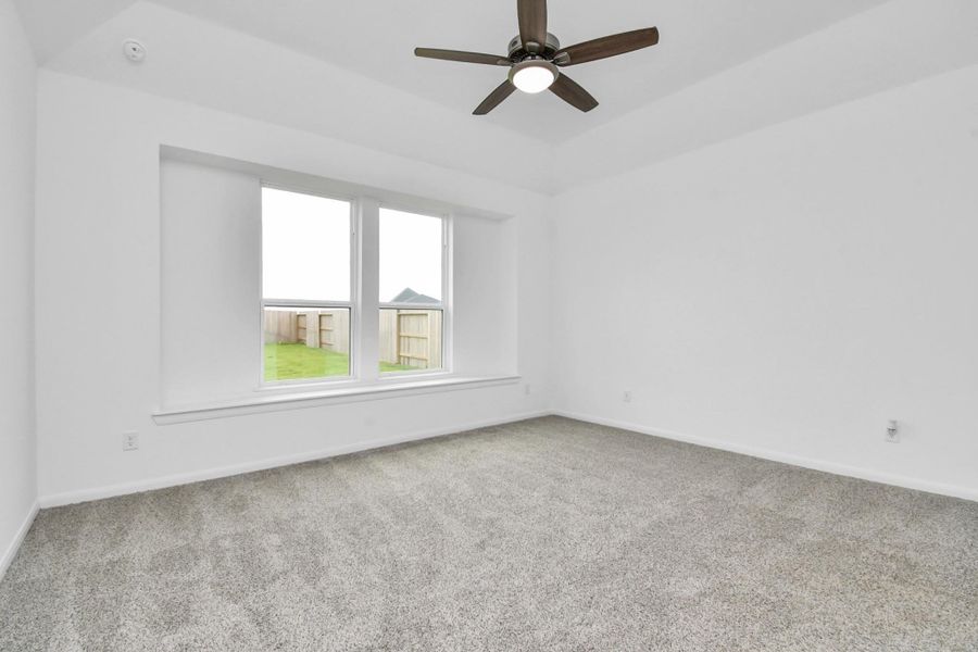 Spacious, unfurnished interior of a new home in Sunterra, Katy (Image 13).