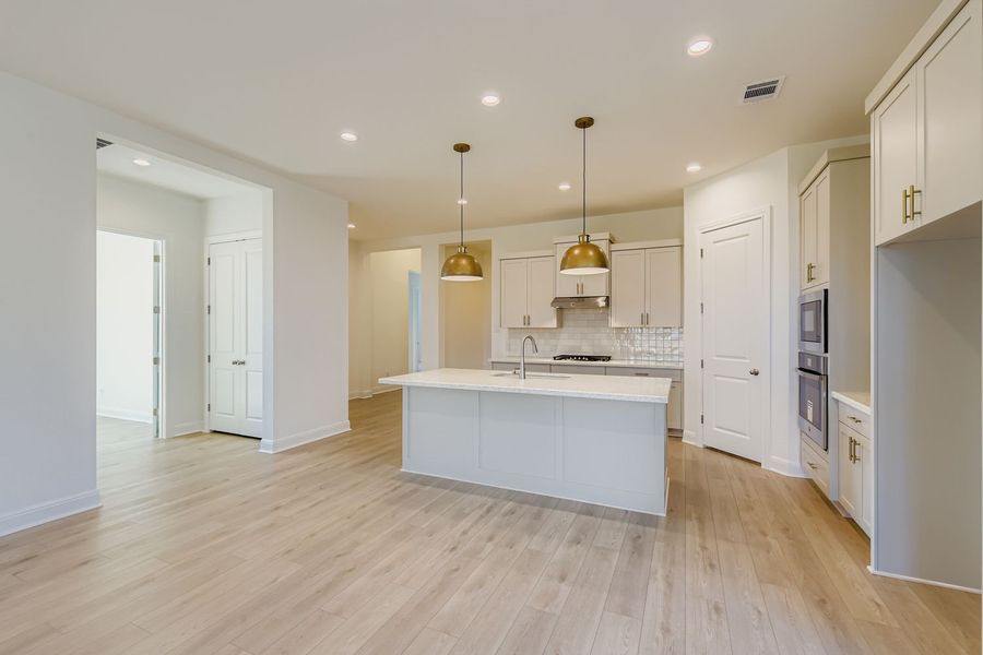 Furnished interior view inside a new home in 6 Creeks, Kyle (Image 6). Furnished interior view inside a new home in 6 Creeks, Kyle (Image 6).
