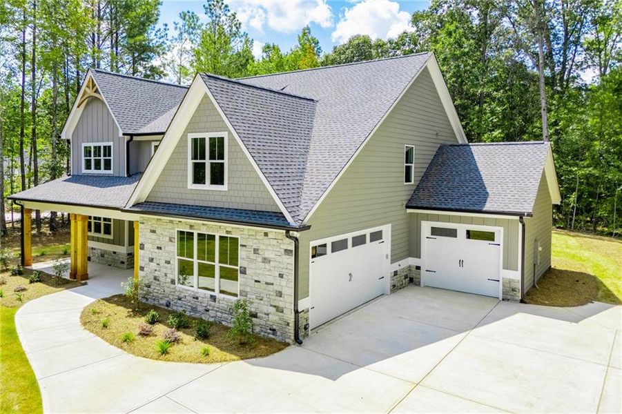 Front exterior of a new home in , Douglasville, GA, highlighting curb appeal (Image 35).