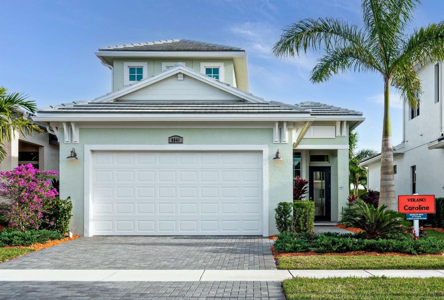 Front exterior of a new home in PGA Village Verano, Port St. Lucie, FL, highlighting curb appeal (Image 2).