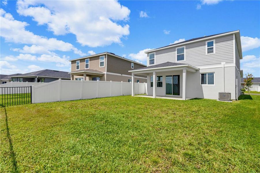 Exterior details and patio area of a home in , Parrish (Image 32).