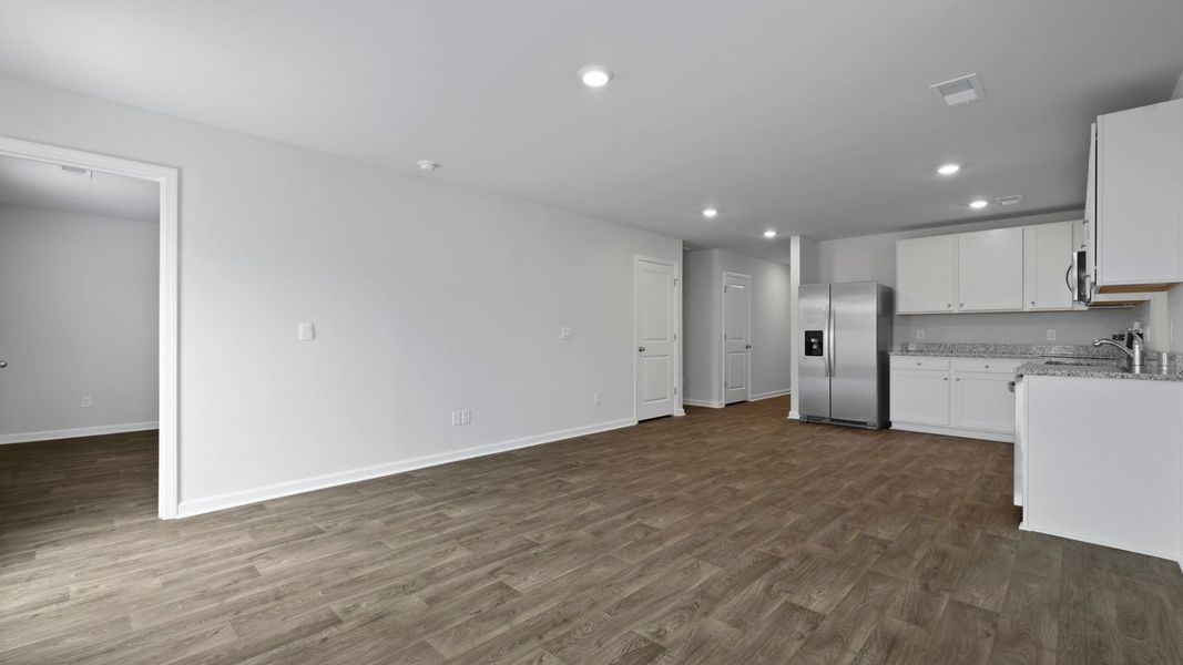 Representative unfurnished interior of a home built from the SULLIVAN by D.R. Horton in Center Pointe, Santee (Image 11).