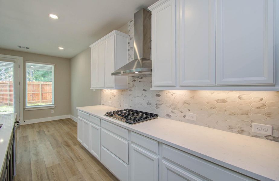 Furnished interior view inside a new home in Harper's Preserve - Classic Series, Conroe (Image 14).