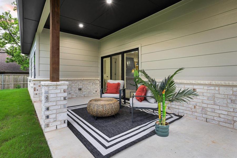 Exterior details and patio area of a home in , Denison (Image 3).
