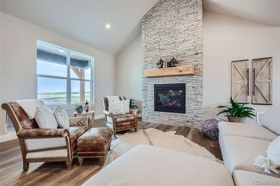 Great Room with floor-to-ceiling Stone Fireplace.