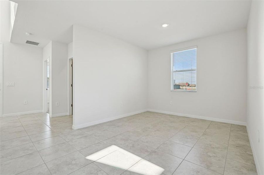 Spacious, unfurnished interior of a new home in Lake Deer Estates - Signature Series, Poinciana (Image 39).