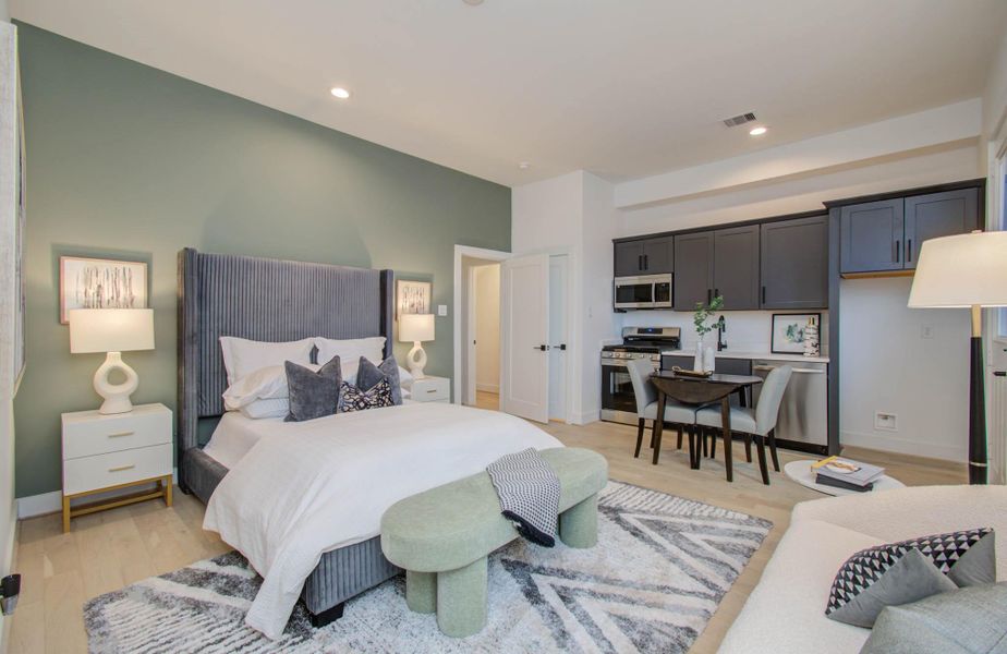 First level bedroom is its own studio apartment that features a private laundry closet, full sized gas stove, vented microwave, full-sized sink, full-sized dish washer and a fridge connection.