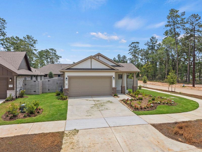 Front exterior of a new home in Two Step Farm, Montgomery, TX, highlighting curb appeal (Image 20). Front exterior of a new home in Two Step Farm, Montgomery, TX, highlighting curb appeal (Image 20).