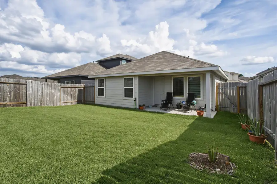 Exterior details and patio area of a home in , Houston (Image 3). Exterior details and patio area of a home in , Houston (Image 3).