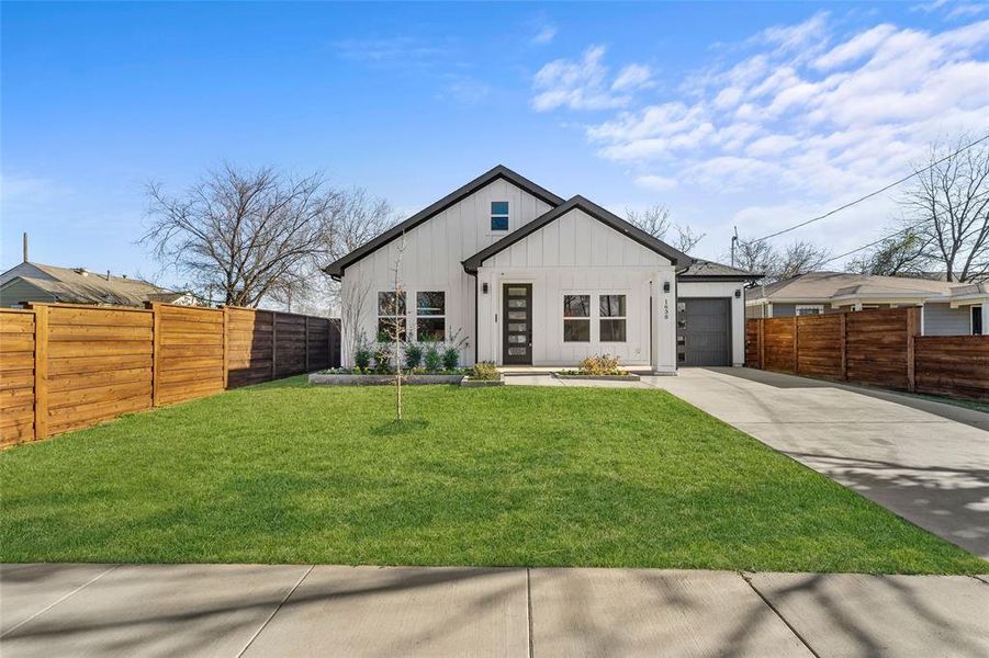 Front exterior of a new home in , Dallas, TX, highlighting curb appeal (Image 21).