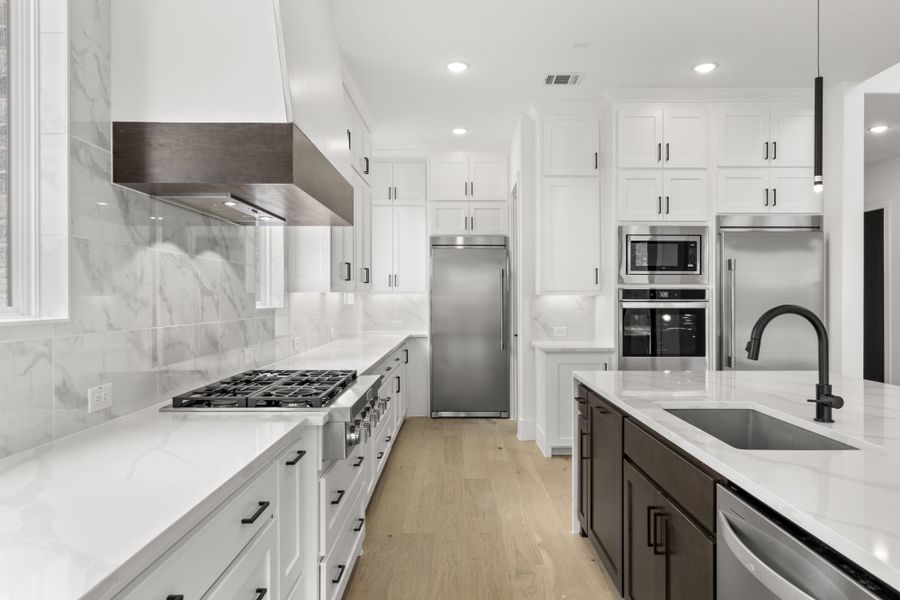 Representative furnished interior of a home built from the 6051 by Tradition Homes in Mustang Lakes, McKinney (Image 6).