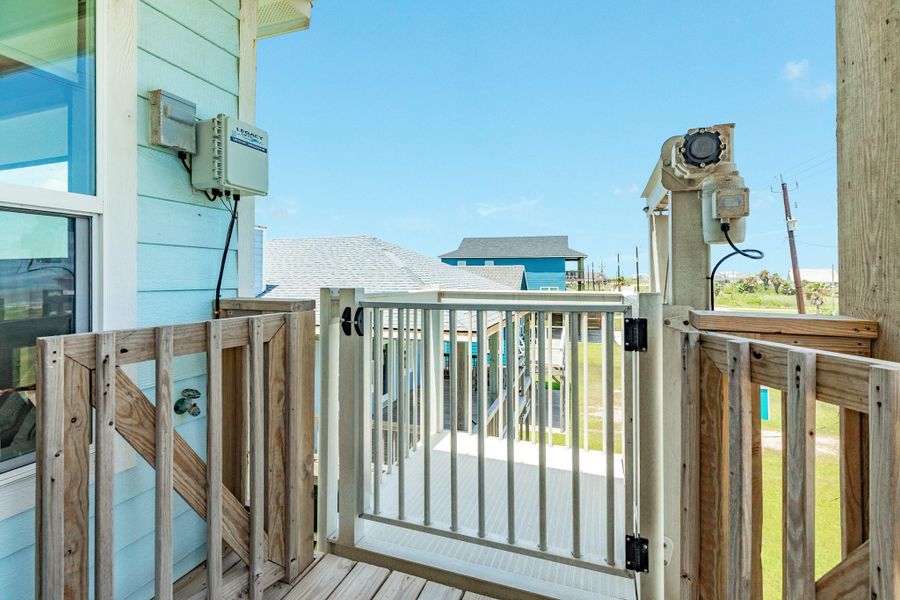 Outdoor cargo lift provides convenient access between levels, adding ease and accessibility to the home's design.