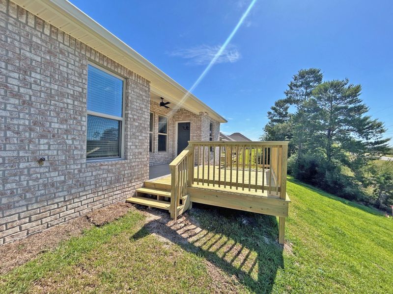 Exterior details and patio area of a home in The Bluffs at Lafayette, Freeport (Image 21).
