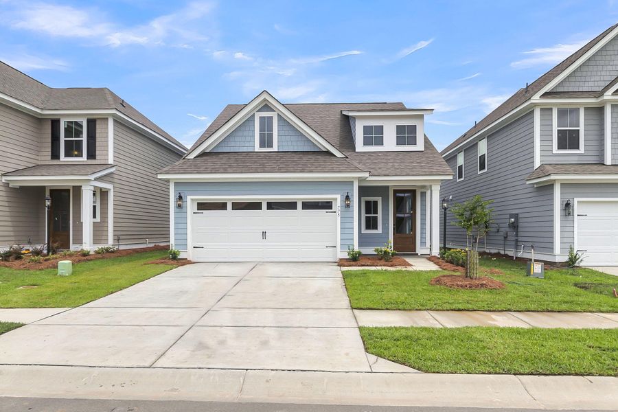 Front exterior of a new home in High Point at Foxbank, Moncks Corner, SC, highlighting curb appeal (Image 31).