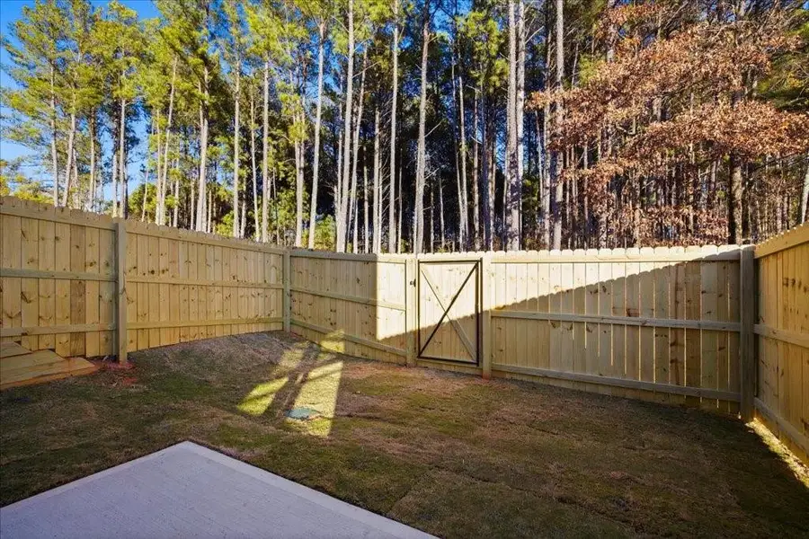 Exterior details and patio area of a home in Shoals Crossing, Conyers (Image 24). Exterior details and patio area of a home in Shoals Crossing, Conyers (Image 24).