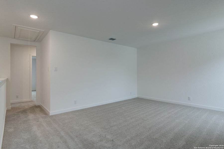 Spacious, unfurnished interior of a new home in The Heights at Saddlebrook Ranch 60's, Schertz (Image 22).