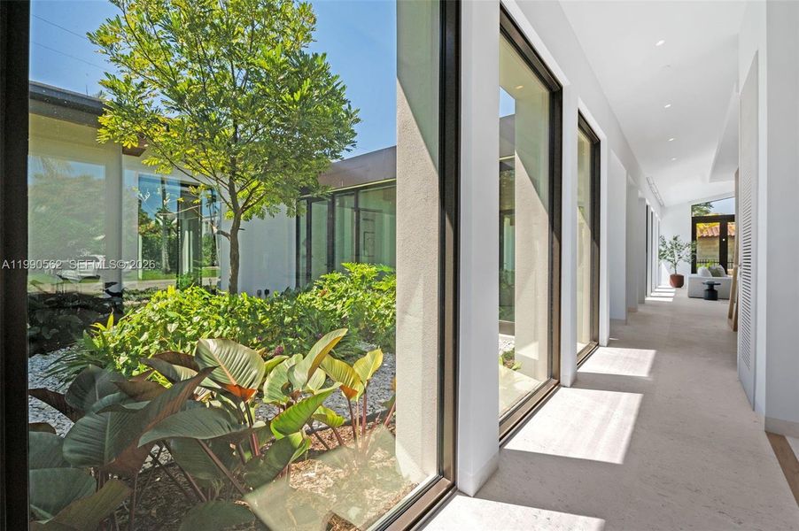 Exterior details and patio area of a home in , Coral Gables (Image 29).
