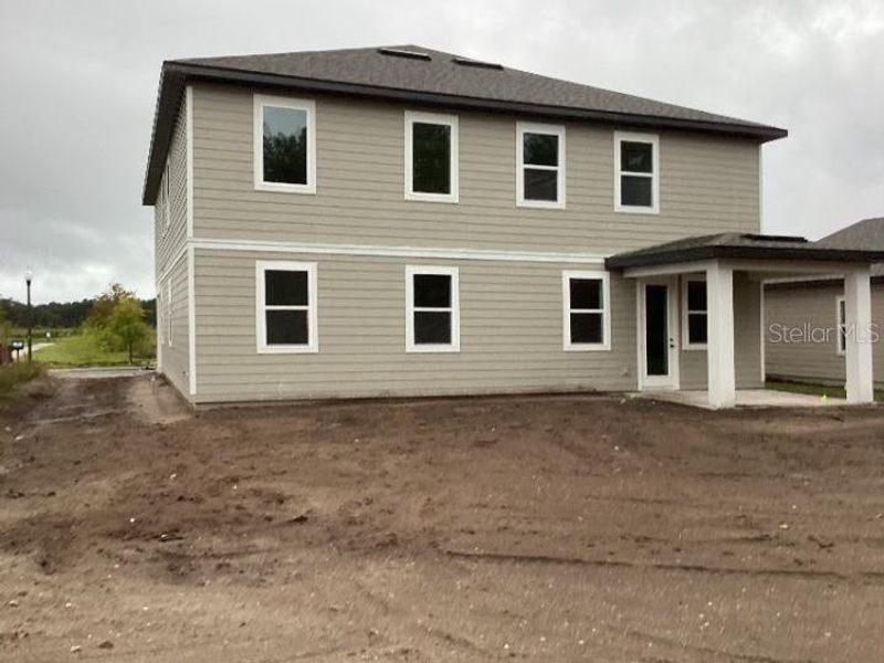 Exterior details and patio area of a home in Ellington Traditional, St. Cloud (Image 3).